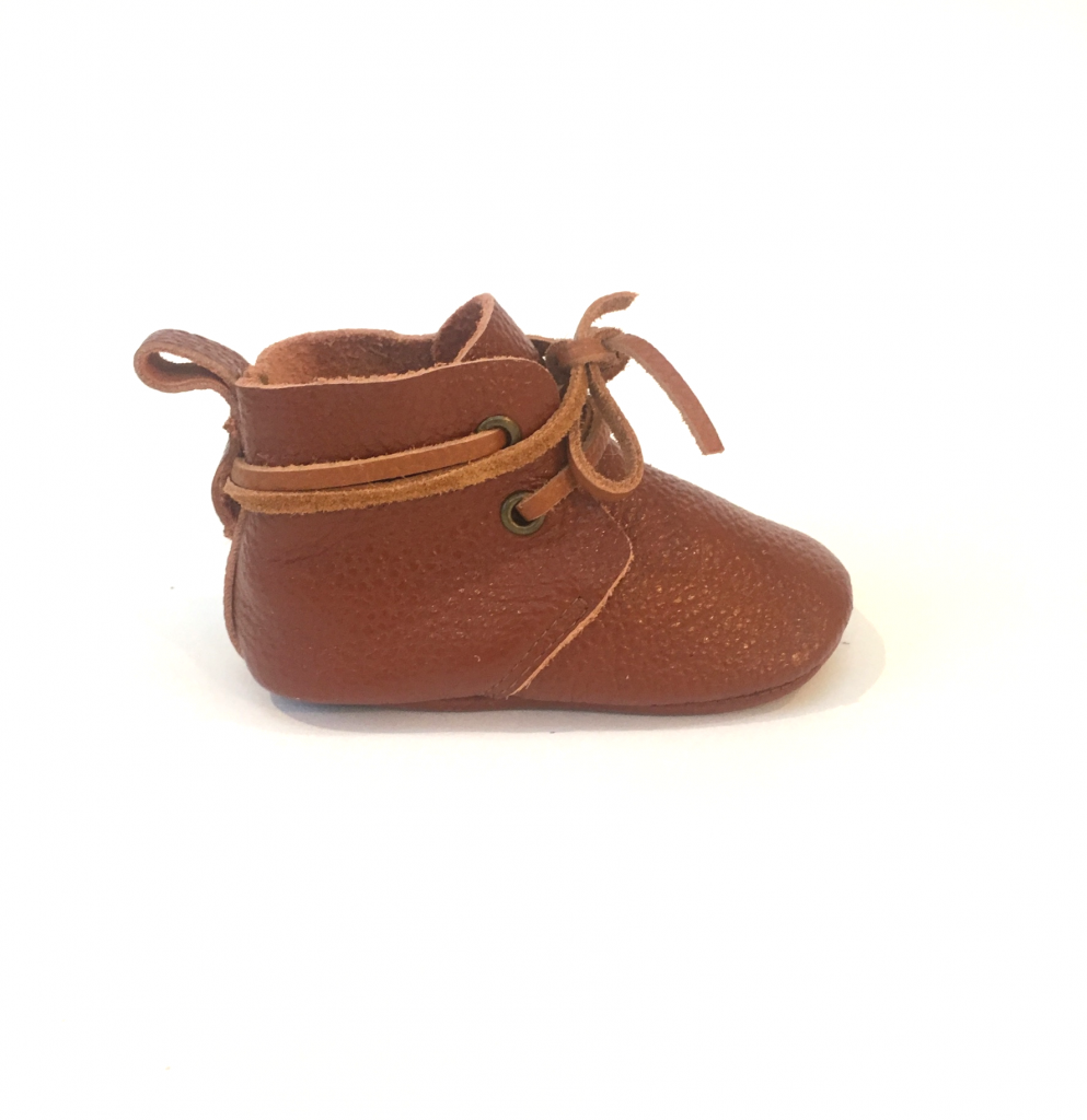 Premium baby boots made for tiny feet in a selection of comfortable and chic styles. Shop leather booties and boot styles for the infant, baby and toddler in your life.